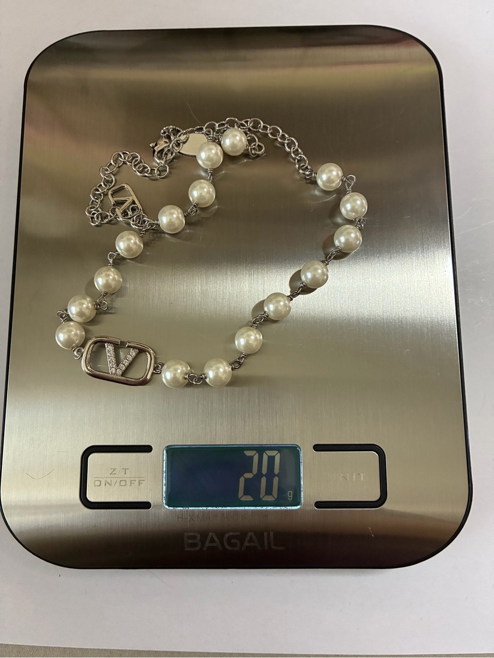 Silver and White Pearl Valentino V-Emblem Necklace - Picture 7 of 11